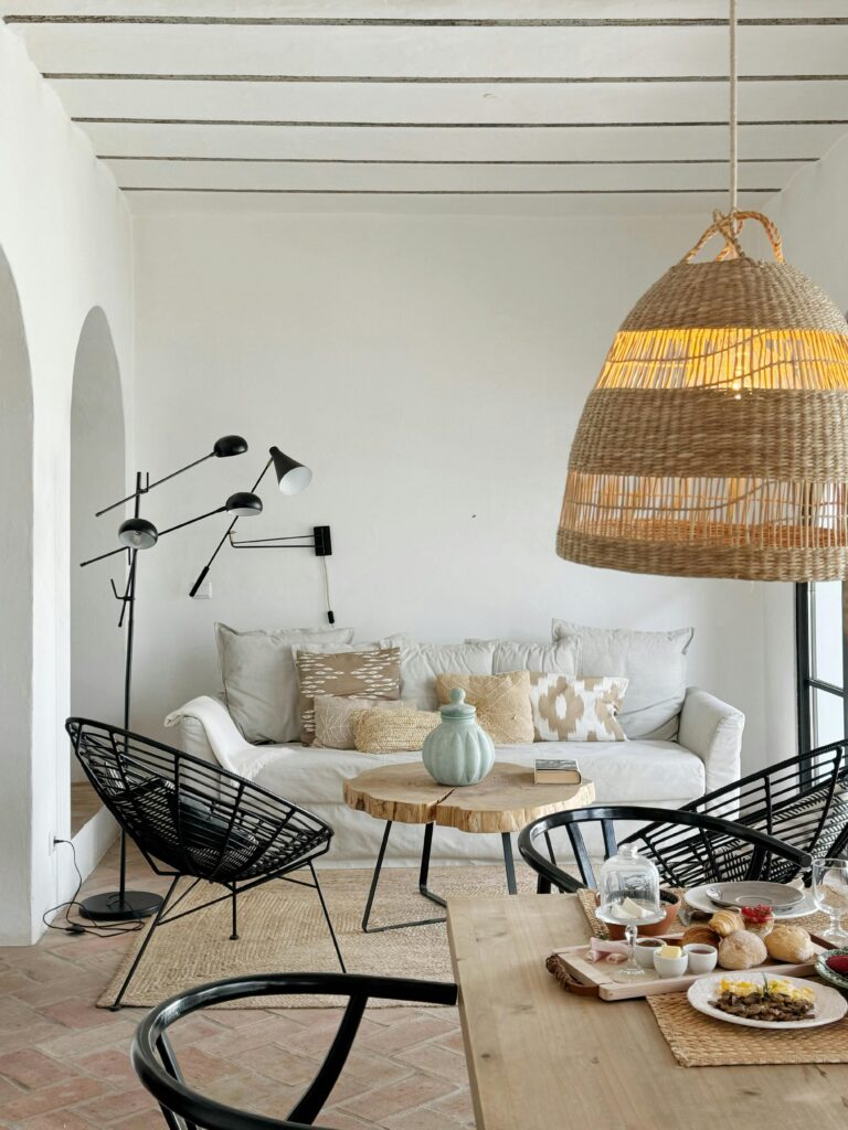 Bright and airy Scandinavian living room with modern furniture and decor elements.